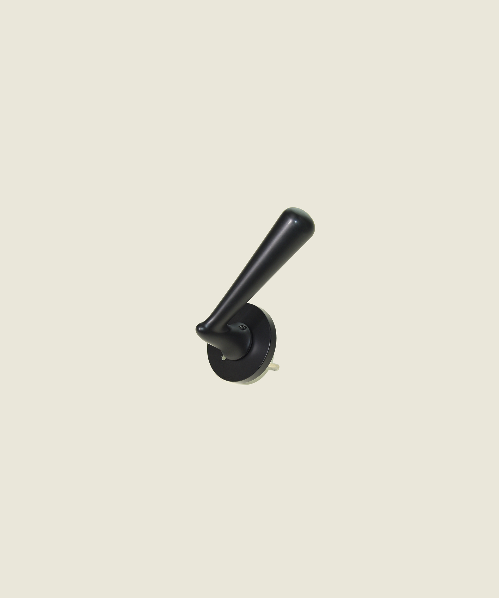 The Rodin Cast door lever in matte black - sculptural rounded form on circular rose, inspired by Rodin's organic shapes