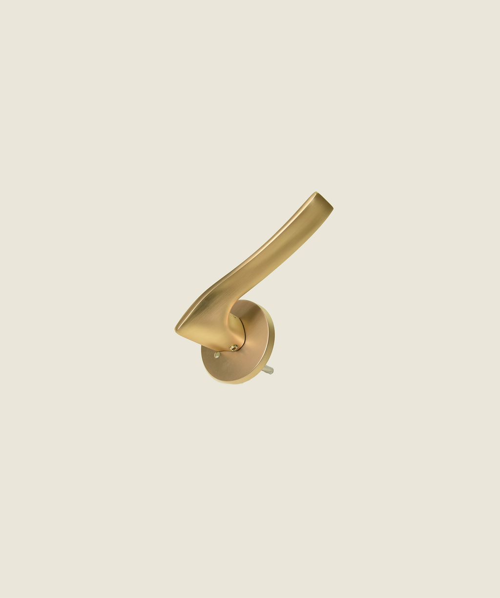 The Dali No. 4 (Gold) - satin brass sculptural door lever with circular rose on neutral background